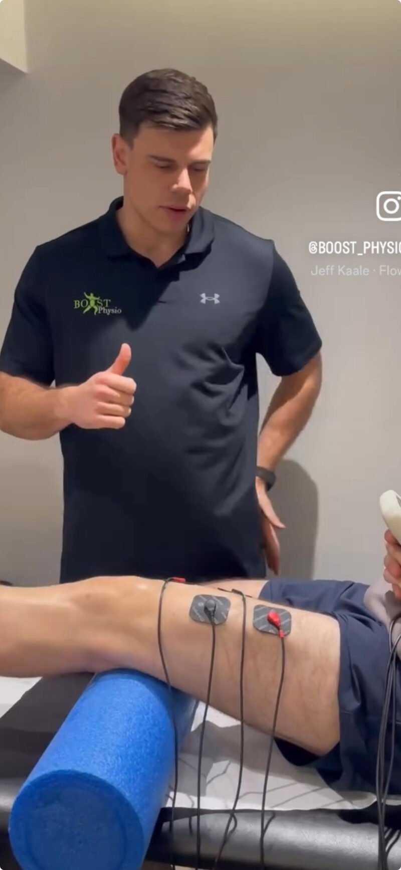 Electro muscular stimulation being used to help switch on the quadriceps during knee rehab
